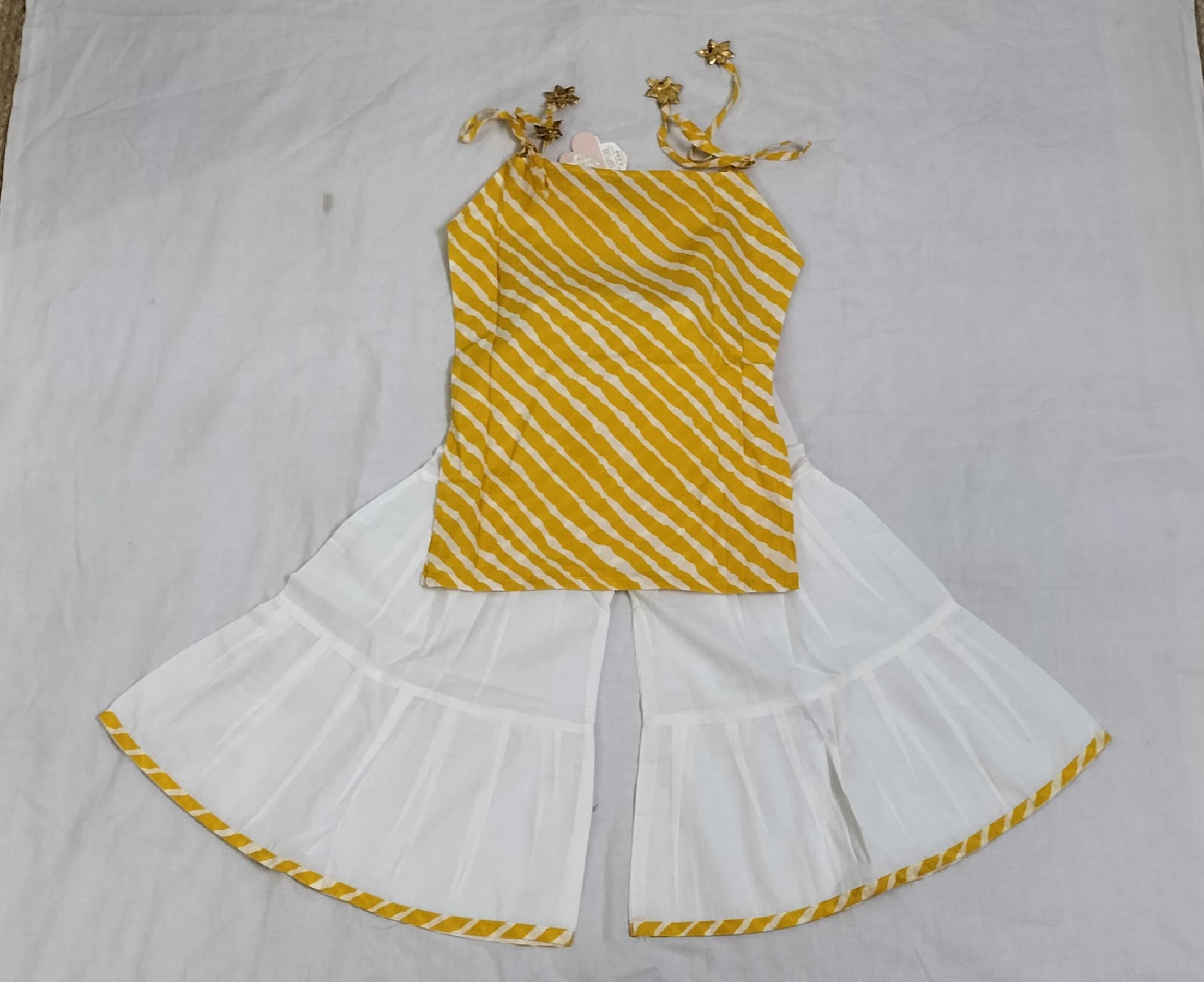 yellow print tie-up kurta with sharara pant